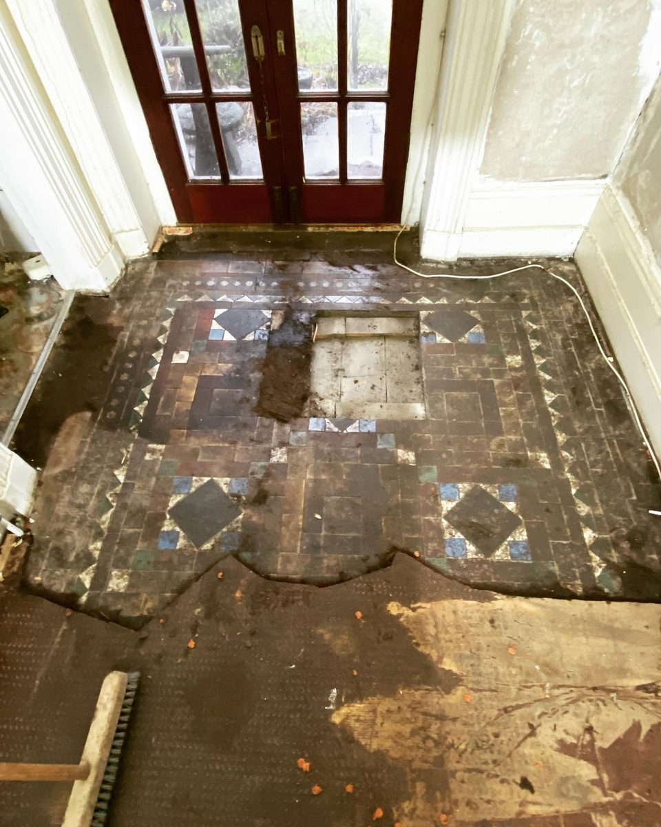 The original encaustic tiles run all the way down the hall (4/4)