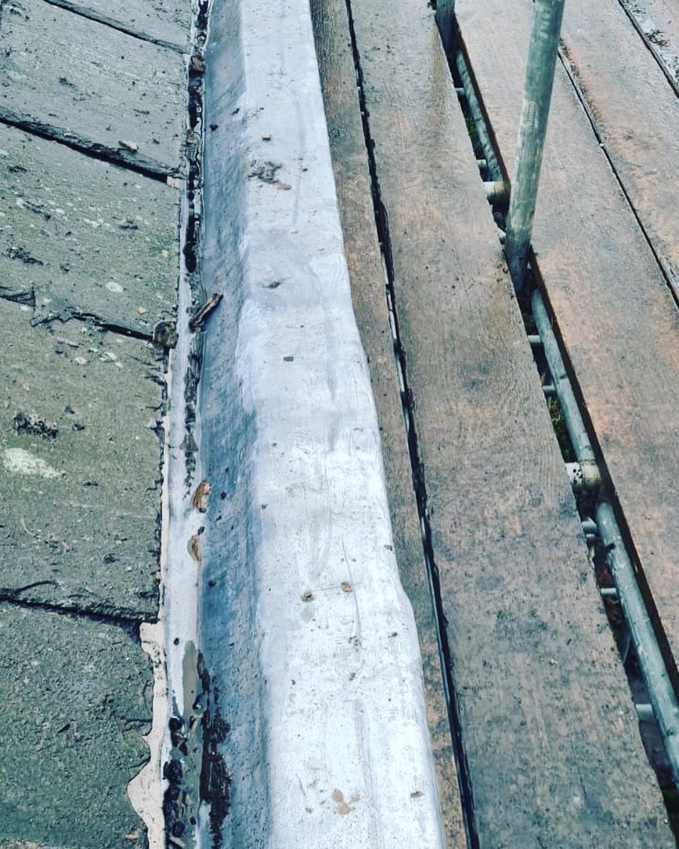 The newly relaid slate roof (2/2)