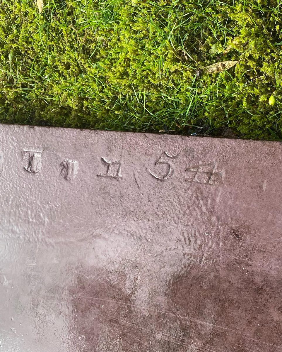 The slate fire mantel dug up from the garden (2/2)