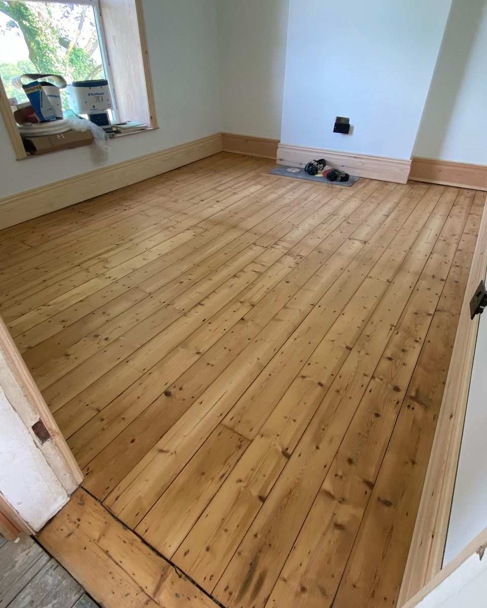 The original parquet floor being sanded back (3/4)