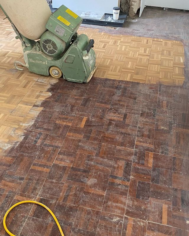 Sander on the parquet floor