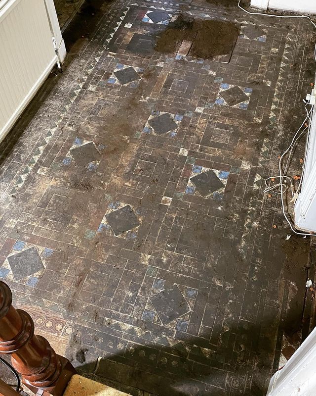 Tiles all the way up the hall